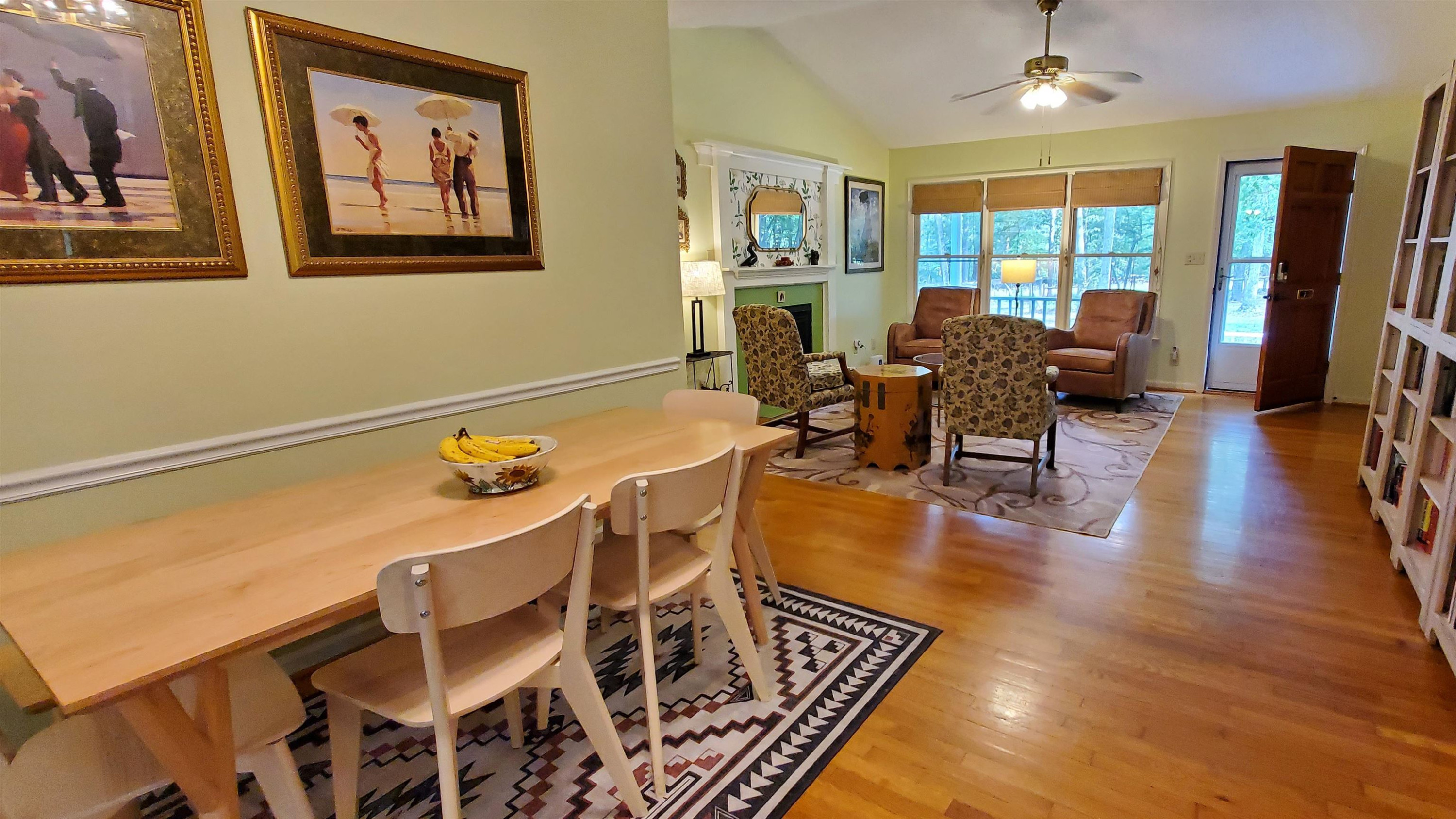 3200 Twin Streams Road Chapel Hill, NC 27516 - Photo 14 of 46 a dining room with wooden floor and large window
