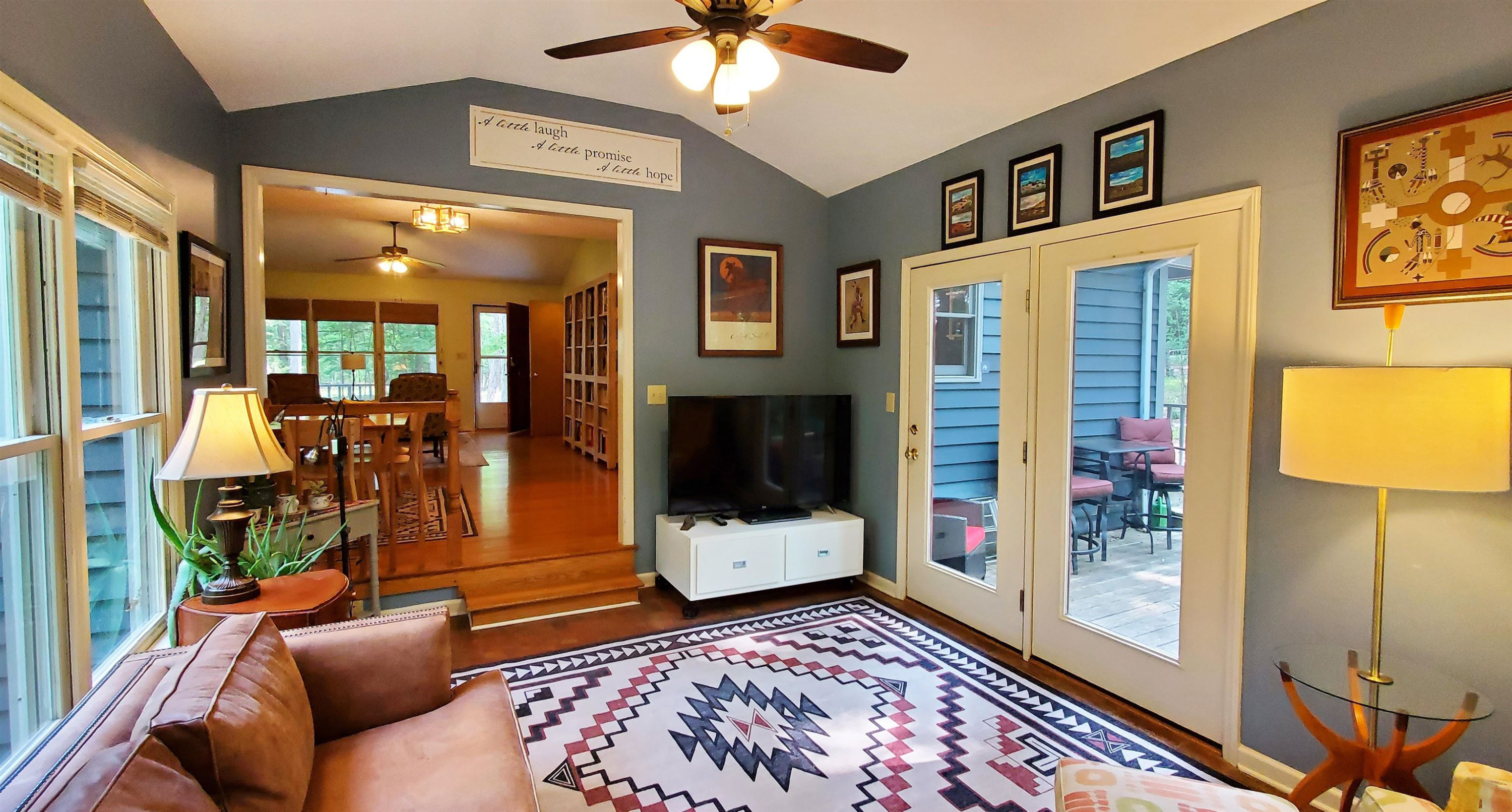 3200 Twin Streams Road Chapel Hill, NC 27516 - Photo 16 of 46 a living room with furniture and a rug