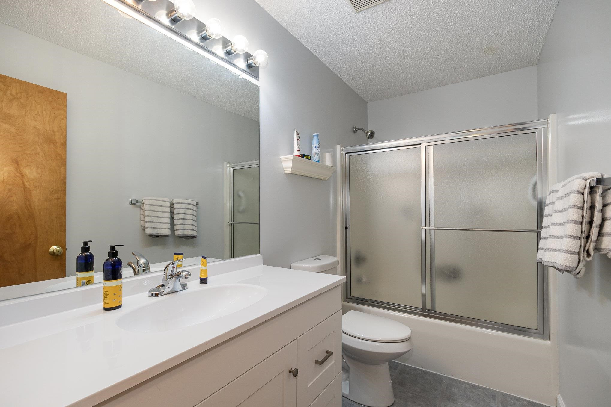 3200 Twin Streams Road Chapel Hill, NC 27516 - Photo 21 of 46 a bathroom with a sink toilet and shower