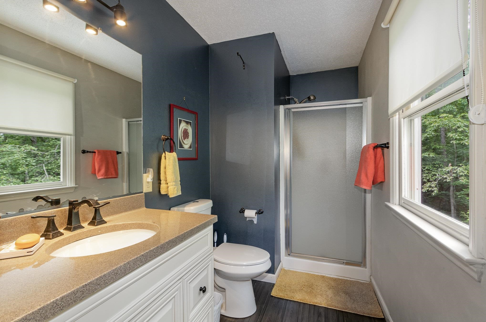 3200 Twin Streams Road Chapel Hill, NC 27516 - Photo 24 of 46 a bathroom with a sink toilet and shower