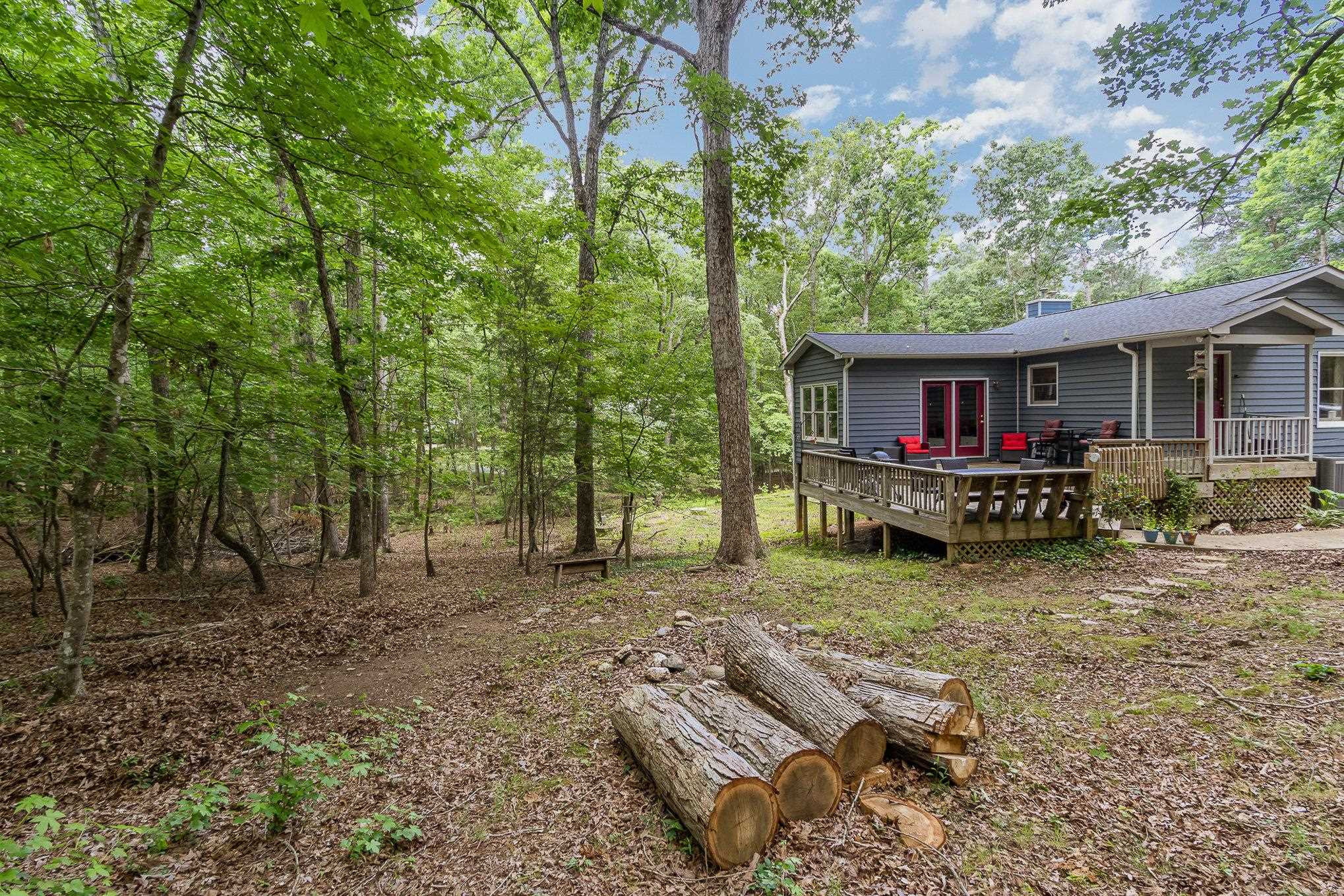 3200 Twin Streams Road Chapel Hill, NC 27516 - Photo 35 of 46 a view of a house with backyard and trees