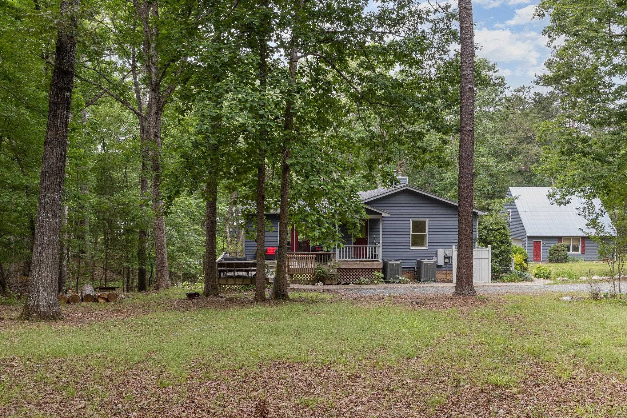 3200 Twin Streams Road Chapel Hill, NC 27516 - Photo 36 of 46 a view of a house with a backyard and a tree