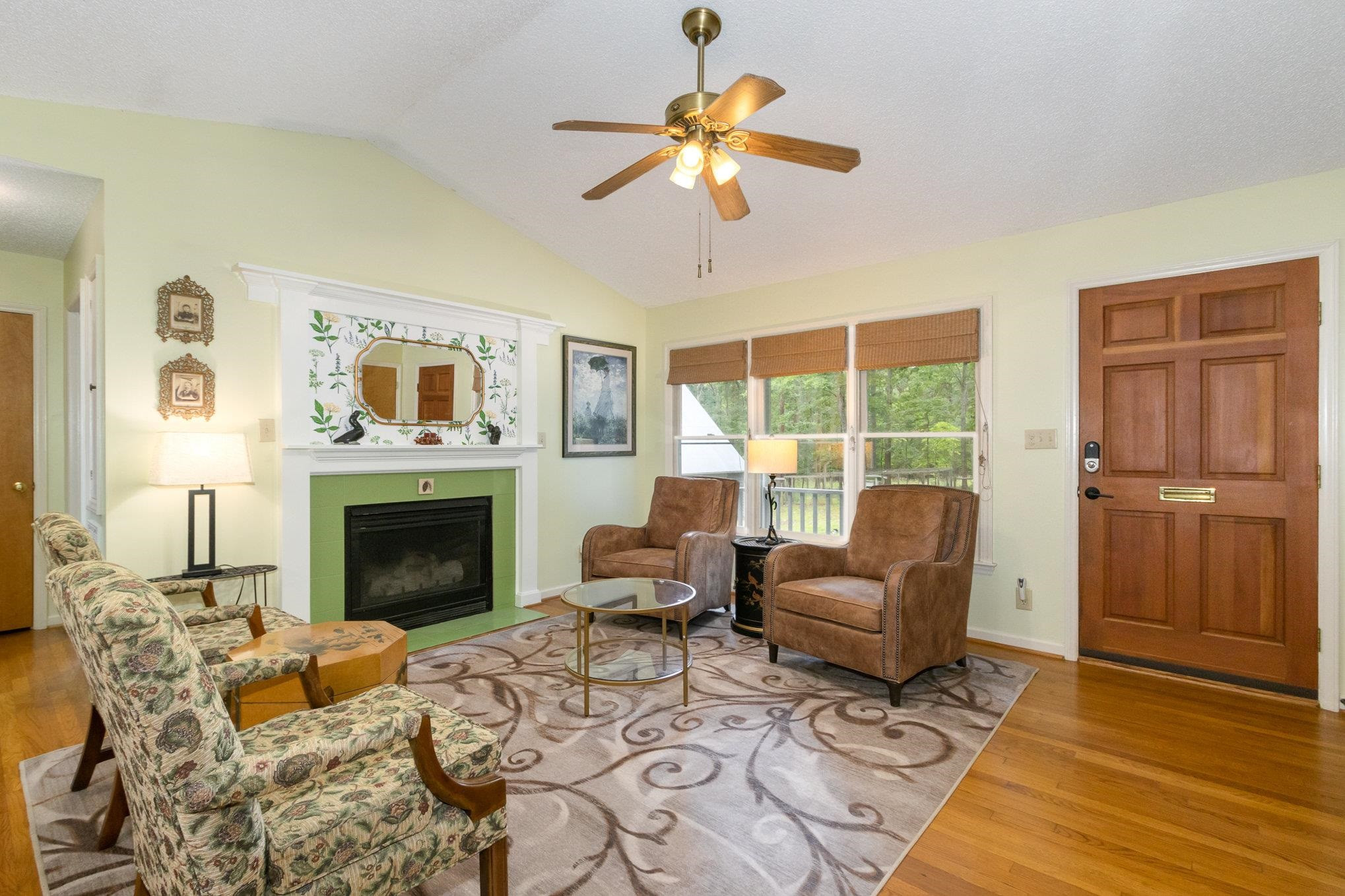 3200 Twin Streams Road Chapel Hill, NC 27516 - Photo 5 of 46 a living room with furniture fireplace and a window