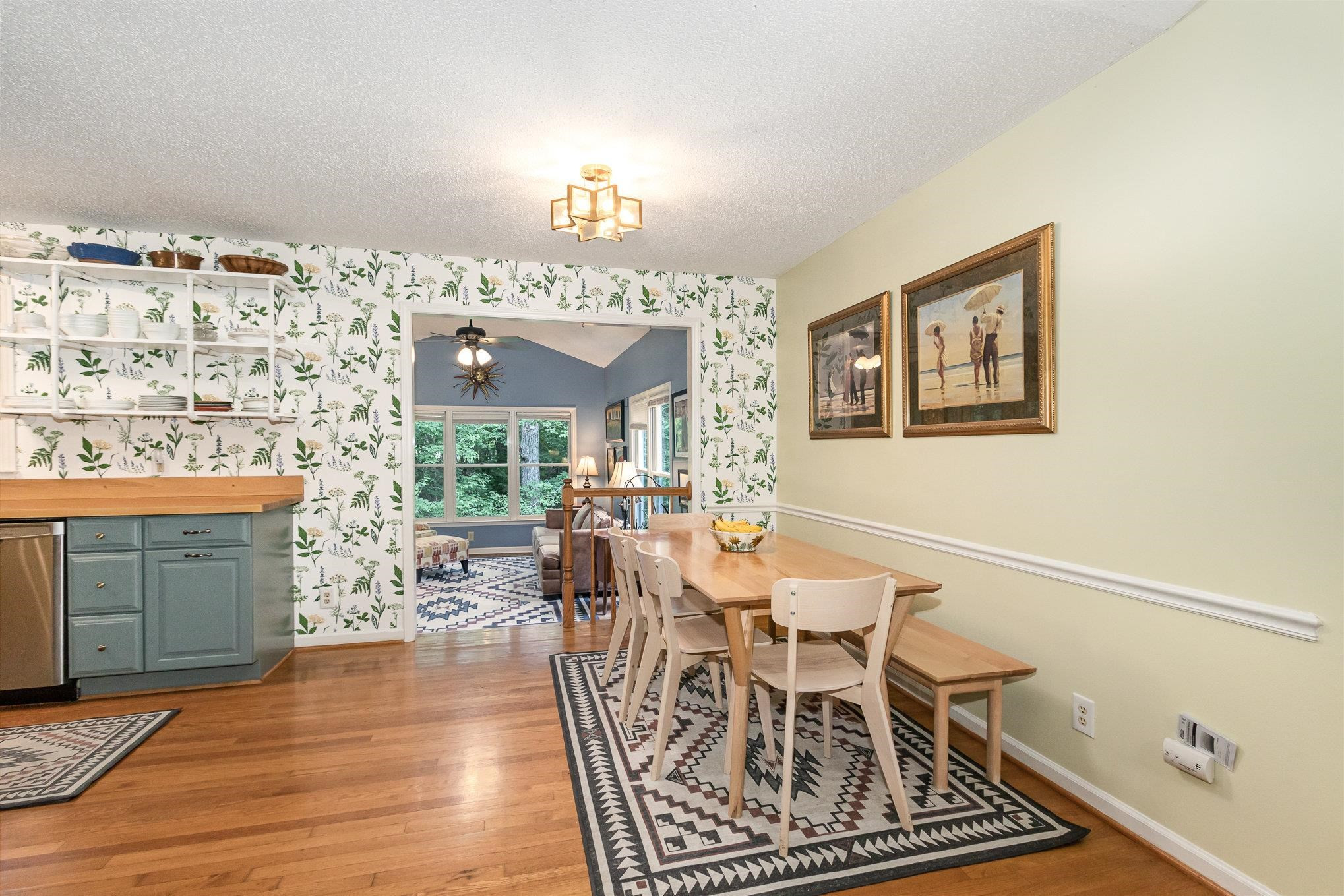 3200 Twin Streams Road Chapel Hill, NC 27516 - Photo 8 of 46 a view of a dining room with furniture window and wooden floor