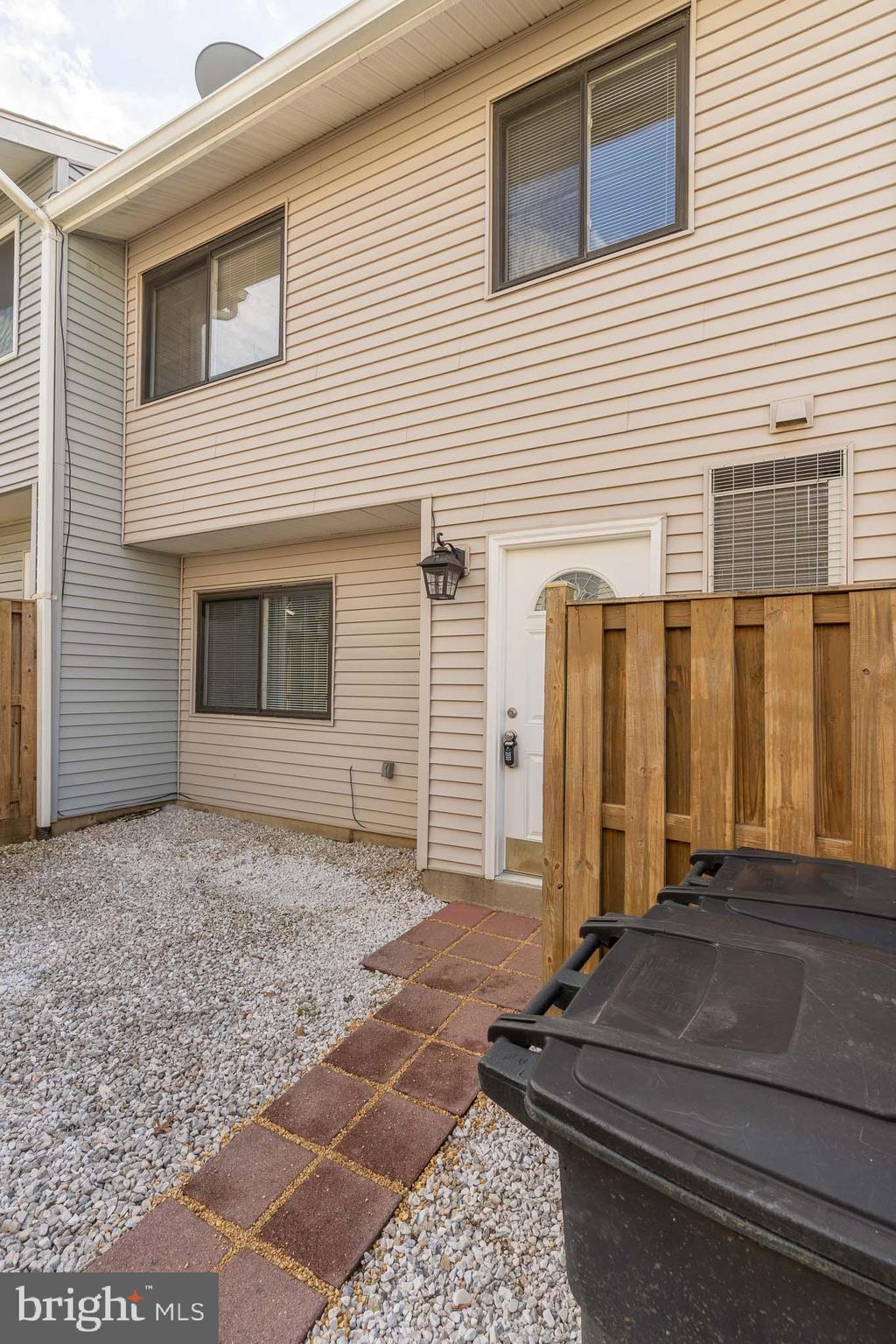 8708 Village Square Drive Alexandria, VA 22309 - Photo 2 of 46 a view of a house with a door and a window