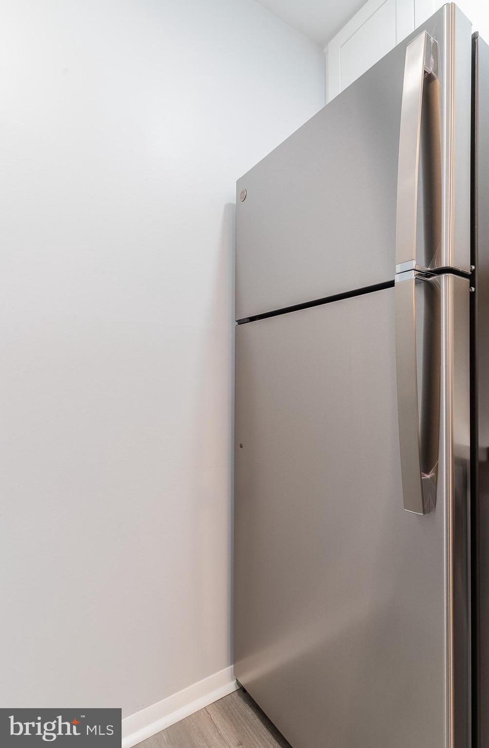 8708 Village Square Drive Alexandria, VA 22309 - Photo 25 of 46 a view of a refrigerator in a kitchen