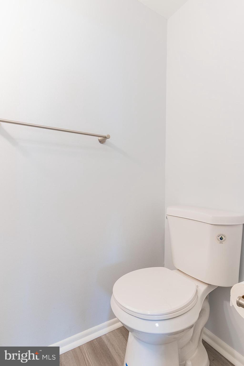 8708 Village Square Drive Alexandria, VA 22309 - Photo 32 of 46 a white toilet sitting next to a shower