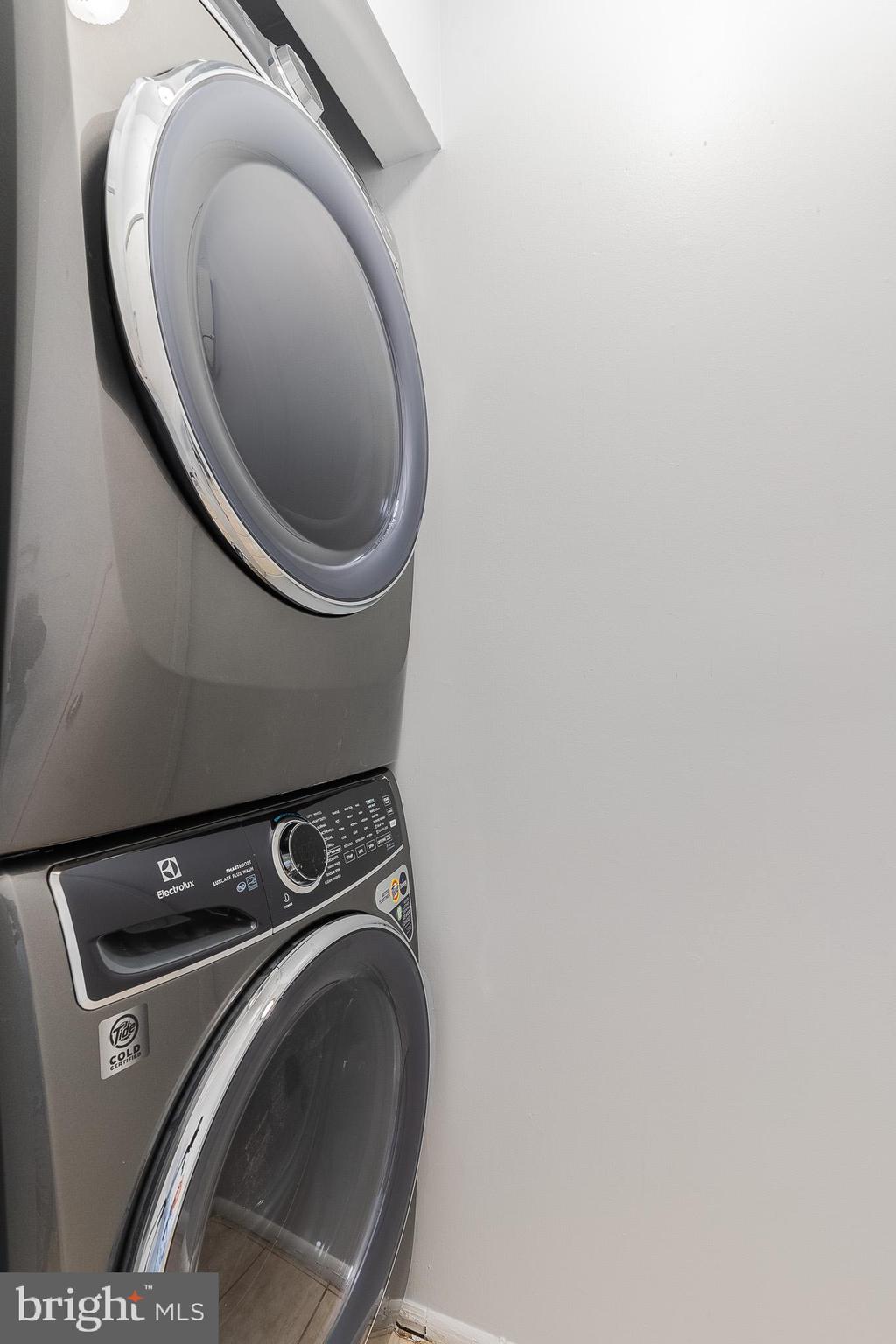 8708 Village Square Drive Alexandria, VA 22309 - Photo 37 of 46 a close up view of washer and dryer