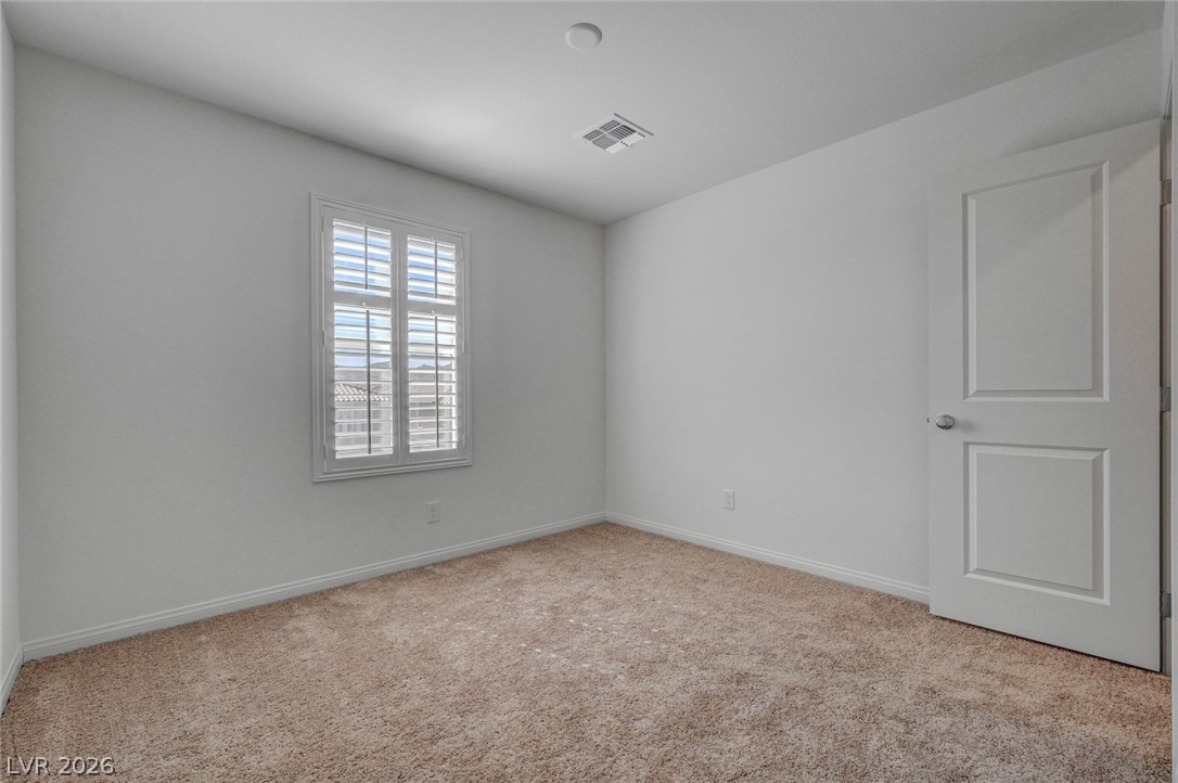 3548 Dimora Street Henderson, NV 89044 - Photo 25 of 40 Carpeted spare room featuring visible vents and baseboards