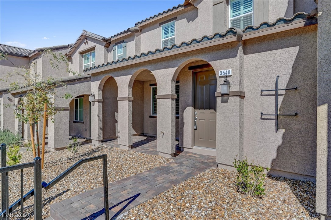 3548 Dimora Street Henderson, NV 89044 - Photo 5 of 40 Mediterranean / spanish house with a tiled roof and stucco siding