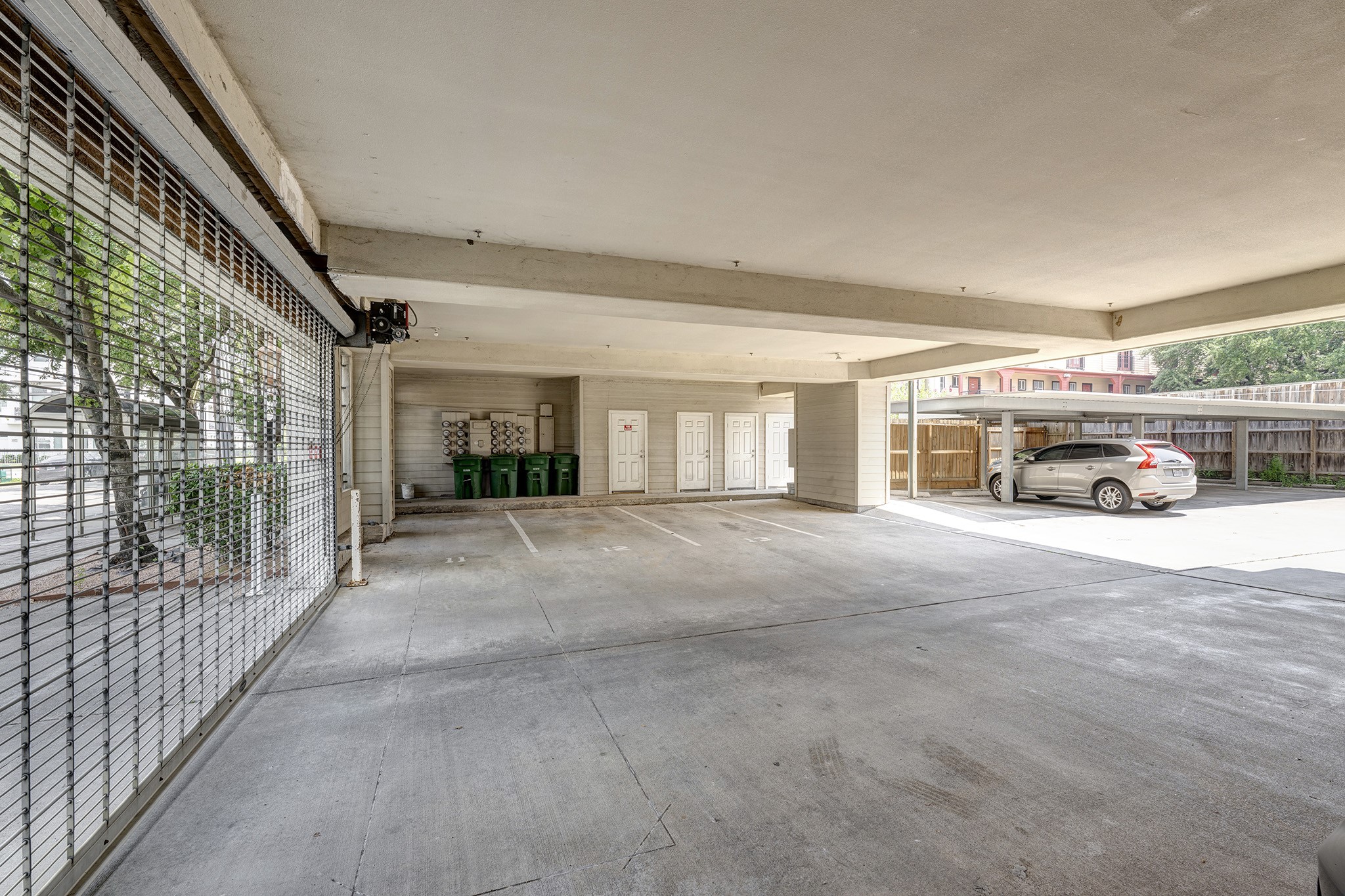 1602 Elgin Street, Unit 13 Houston, TX 77004 - Photo 17 of 18 a view of a car garage door