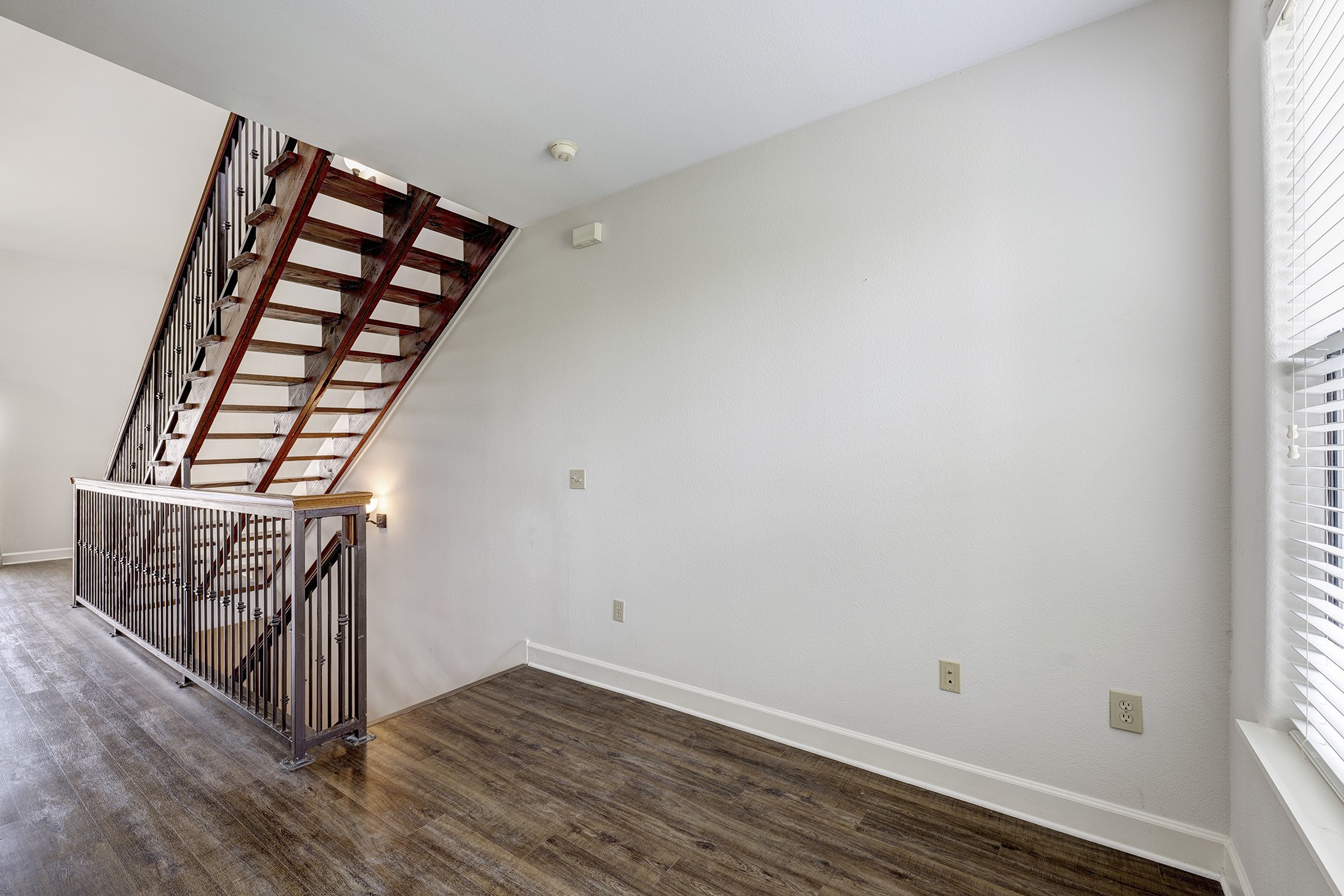 1602 Elgin Street, Unit 13 Houston, TX 77004 - Photo 8 of 18 a view of entryway with wooden floor