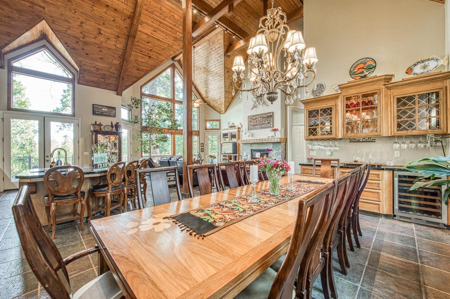 42676 Granite Circle Shaver Lake, CA 93664 - Photo 12 of 99 a view of a dining room with furniture window and outside view