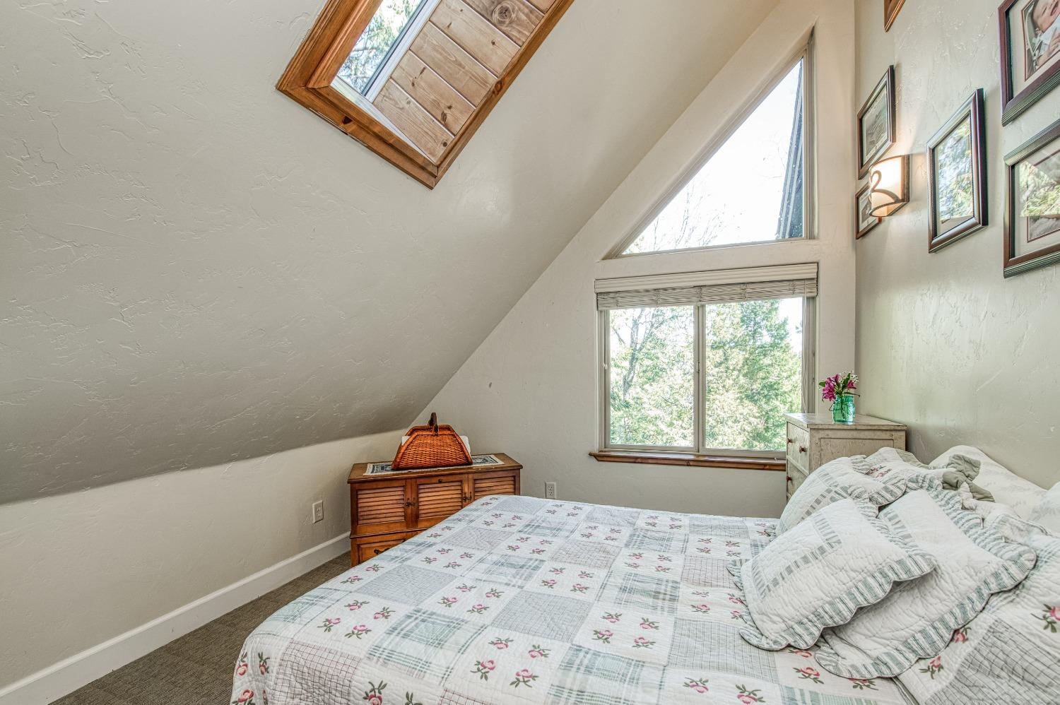 42676 Granite Circle Shaver Lake, CA 93664 - Photo 43 of 99 a bedroom with a bed and a window