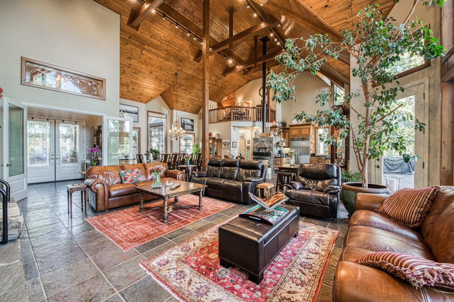 42676 Granite Circle Shaver Lake, CA 93664 - Photo 5 of 99 a outdoor living space with patio furniture and a potted plant