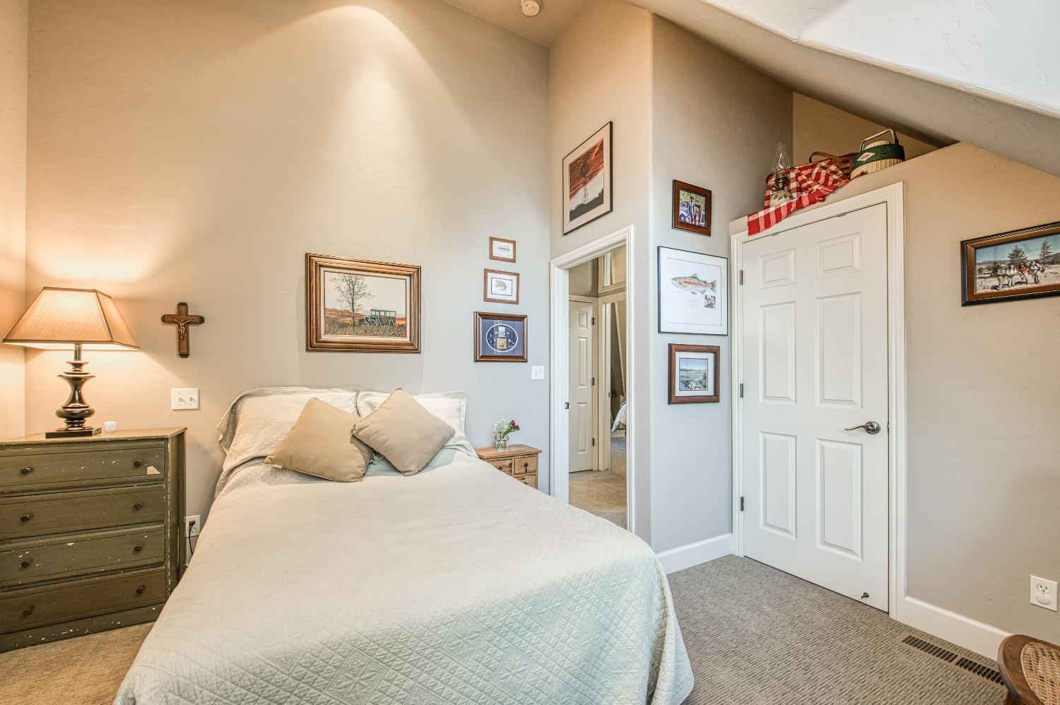 42676 Granite Circle Shaver Lake, CA 93664 - Photo 54 of 99 a bedroom with a large bed and a closet