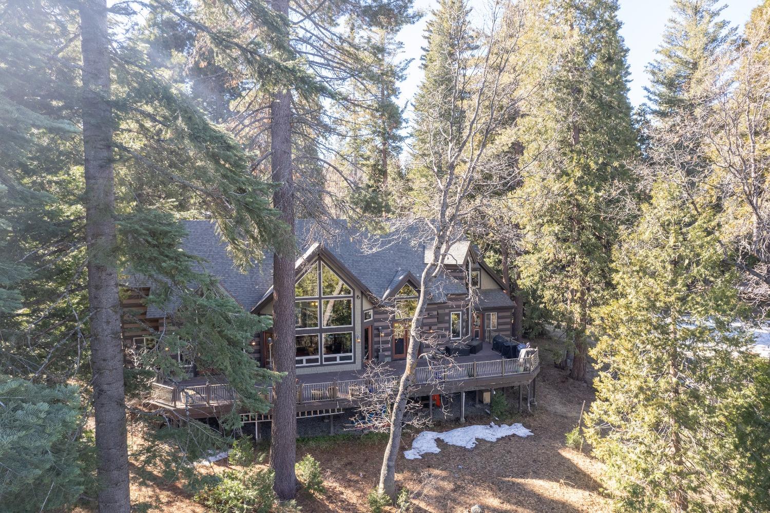 42676 Granite Circle Shaver Lake, CA 93664 - Photo 57 of 99 a front view of a house with a yard