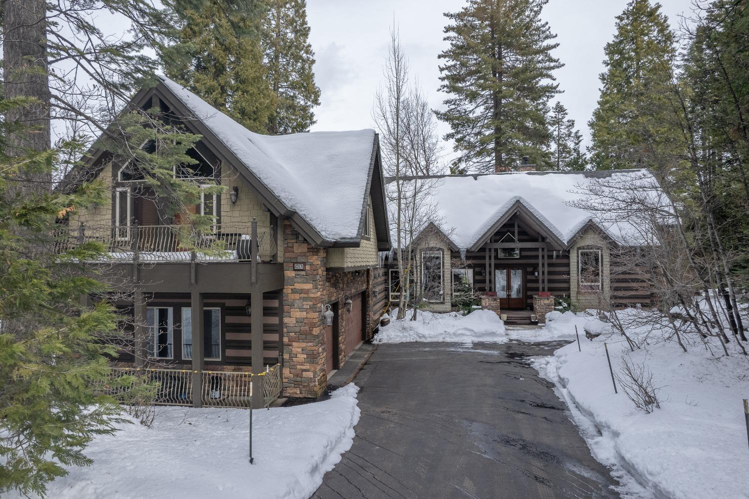 42676 Granite Circle Shaver Lake, CA 93664 - Photo 65 of 99 a view of a house with a yard covered in snow