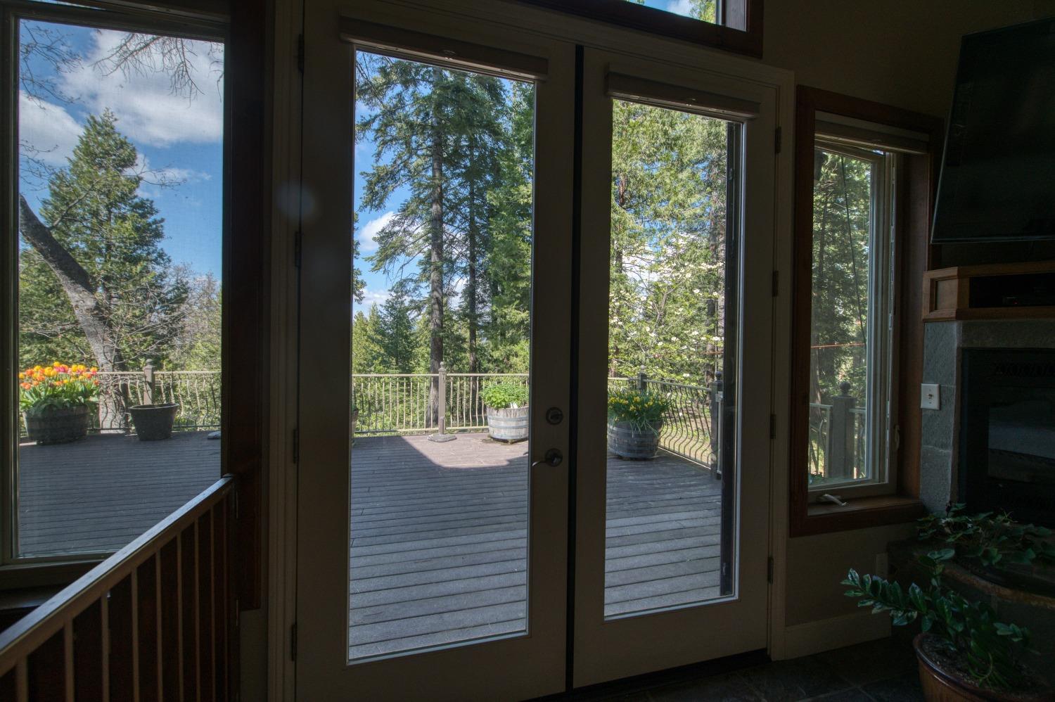 42676 Granite Circle Shaver Lake, CA 93664 - Photo 74 of 99 a view of a glass door and the balcony