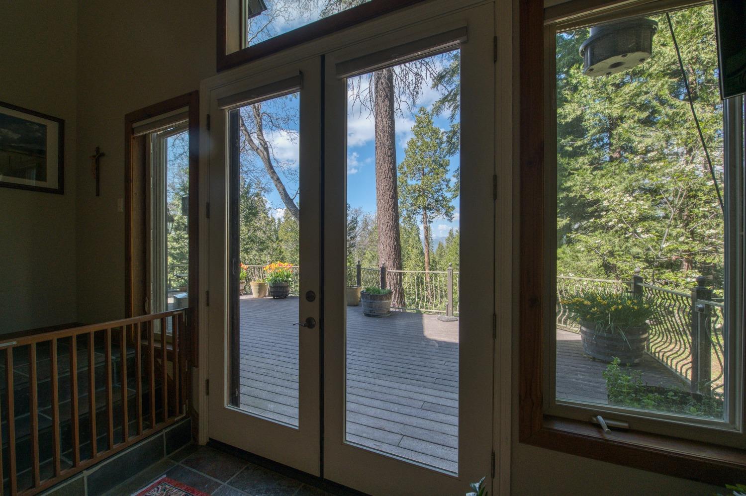 42676 Granite Circle Shaver Lake, CA 93664 - Photo 75 of 99 a view of a glass door and porch
