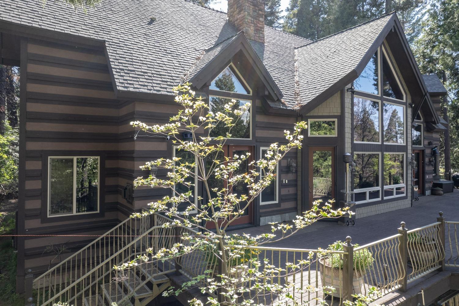 42676 Granite Circle Shaver Lake, CA 93664 - Photo 98 of 99 a view of a house with a tree in front