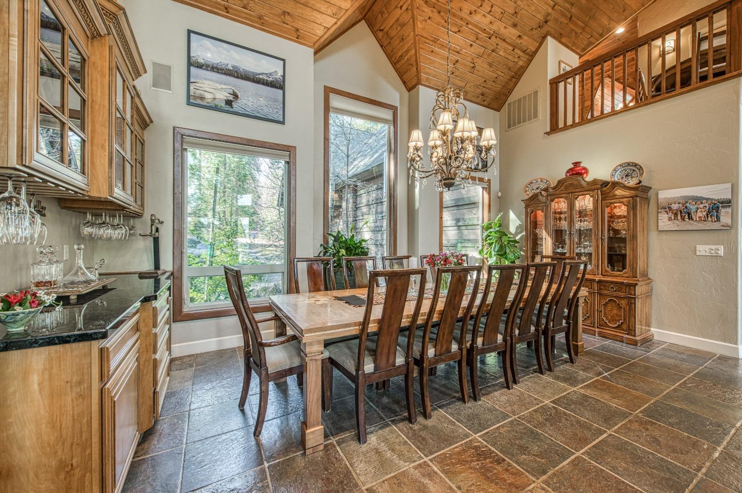 42676 Granite Circle Shaver Lake, CA 93664 - Photo 10 of 99 a view of a dining room with furniture window and outside view