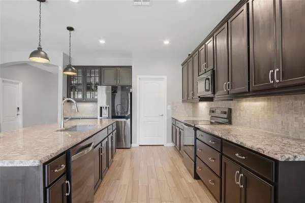 $600,000 | 6818 Goldflower Avenue, Harmony, FL 34773