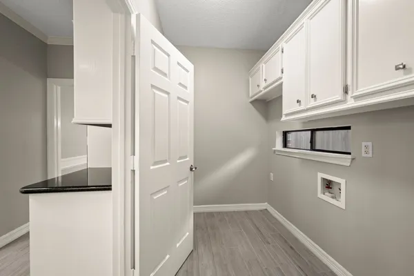 a view of a kitchen from the hallway