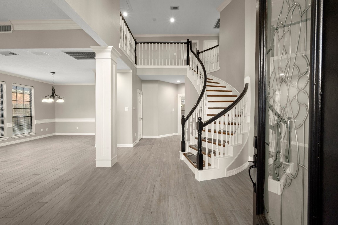 8222 Redchurch Drive Spring, TX 77379 - Photo 5 of 36 a view of an entryway with wooden floor