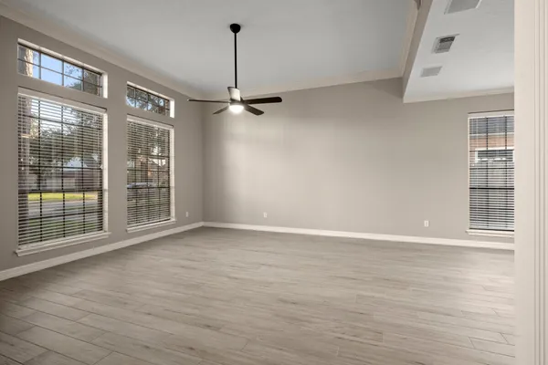 a view of an empty room with a window