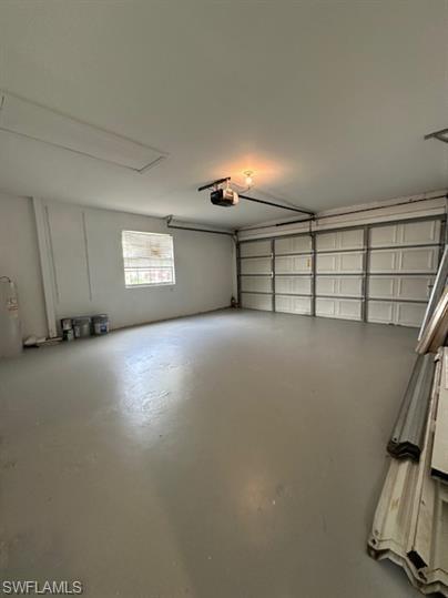 12691 Eagle Pointe Circle Fort Myers, FL 33913 - Photo 18 of 22 Garage featuring a garage door opener