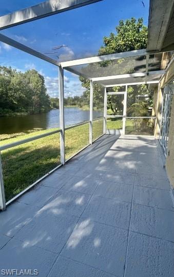 12691 Eagle Pointe Circle Fort Myers, FL 33913 - Photo 19 of 22 Unfurnished sunroom featuring a water view