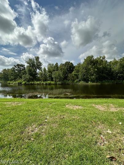 12691 Eagle Pointe Circle Fort Myers, FL 33913 - Photo 21 of 22 View of yard with a water view
