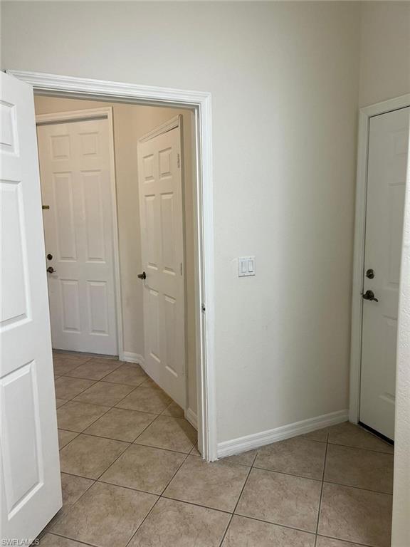 7515 Bristol Circle Naples, FL 34120 - Photo 20 of 42 a view of an empty room