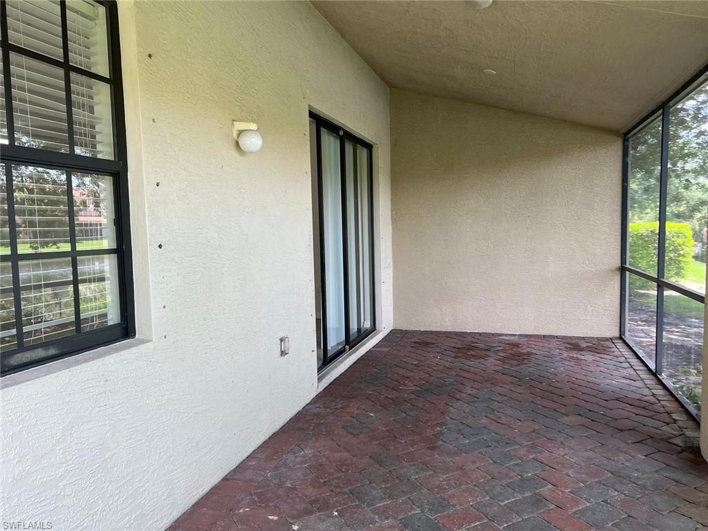 7515 Bristol Circle Naples, FL 34120 - Photo 36 of 42 a view of an empty room with a window