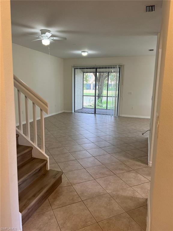 7515 Bristol Circle Naples, FL 34120 - Photo 5 of 42 a view of entryway and hall with wooden floor