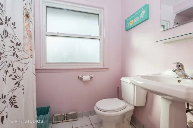 a bathroom with a sink and a toilet