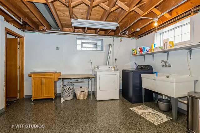 a utility room with dryer and washer