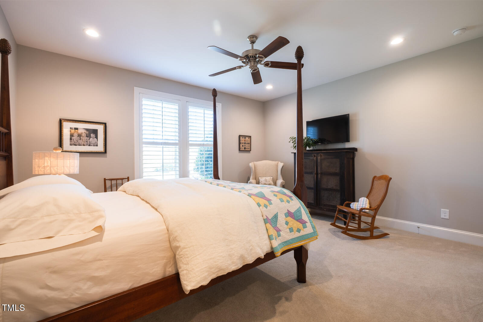 4331 Millcreek Circle Pittsboro, NC 27312 - Photo 17 of 56 a bedroom with a bed and a flat screen tv
