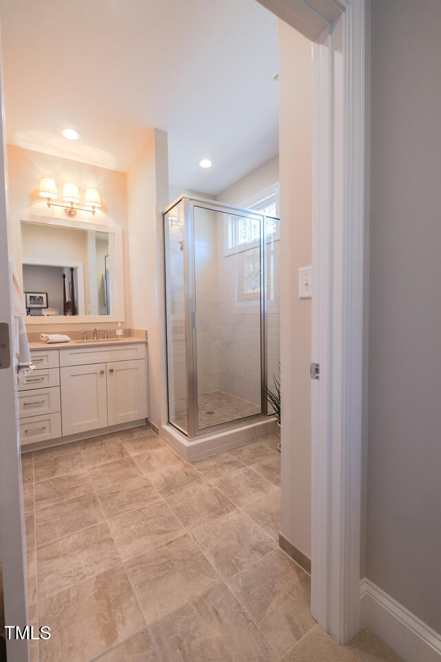 4331 Millcreek Circle Pittsboro, NC 27312 - Photo 20 of 56 a view of a hallway with bathroom and a sink