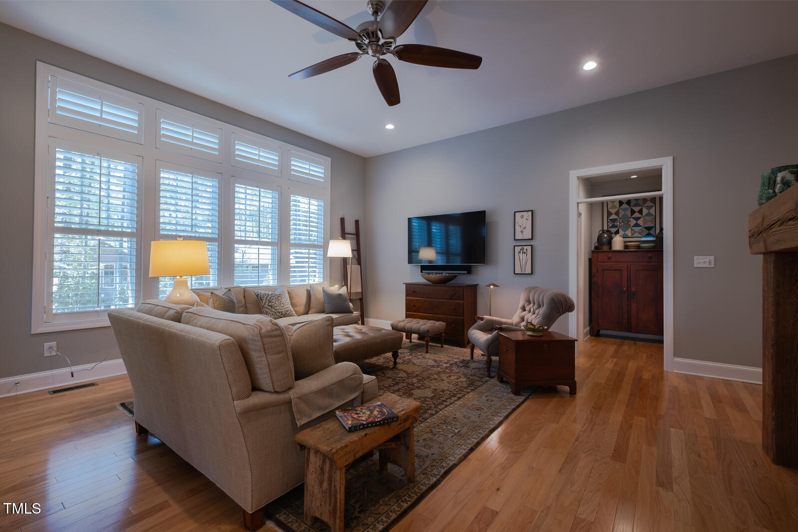 4331 Millcreek Circle Pittsboro, NC 27312 - Photo 28 of 56 a living room with furniture and a flat screen tv