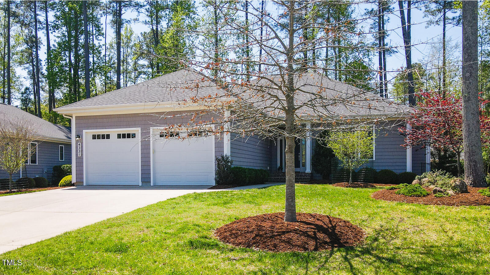 4331 Millcreek Circle Pittsboro, NC 27312 - Photo 2 of 56 a view of a house with backyard and a tree