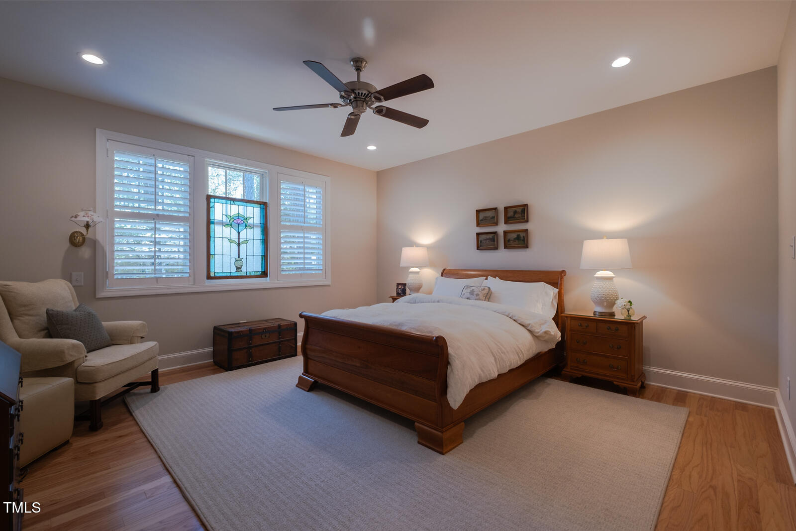 4331 Millcreek Circle Pittsboro, NC 27312 - Photo 30 of 56 a bedroom with a bed couch and window
