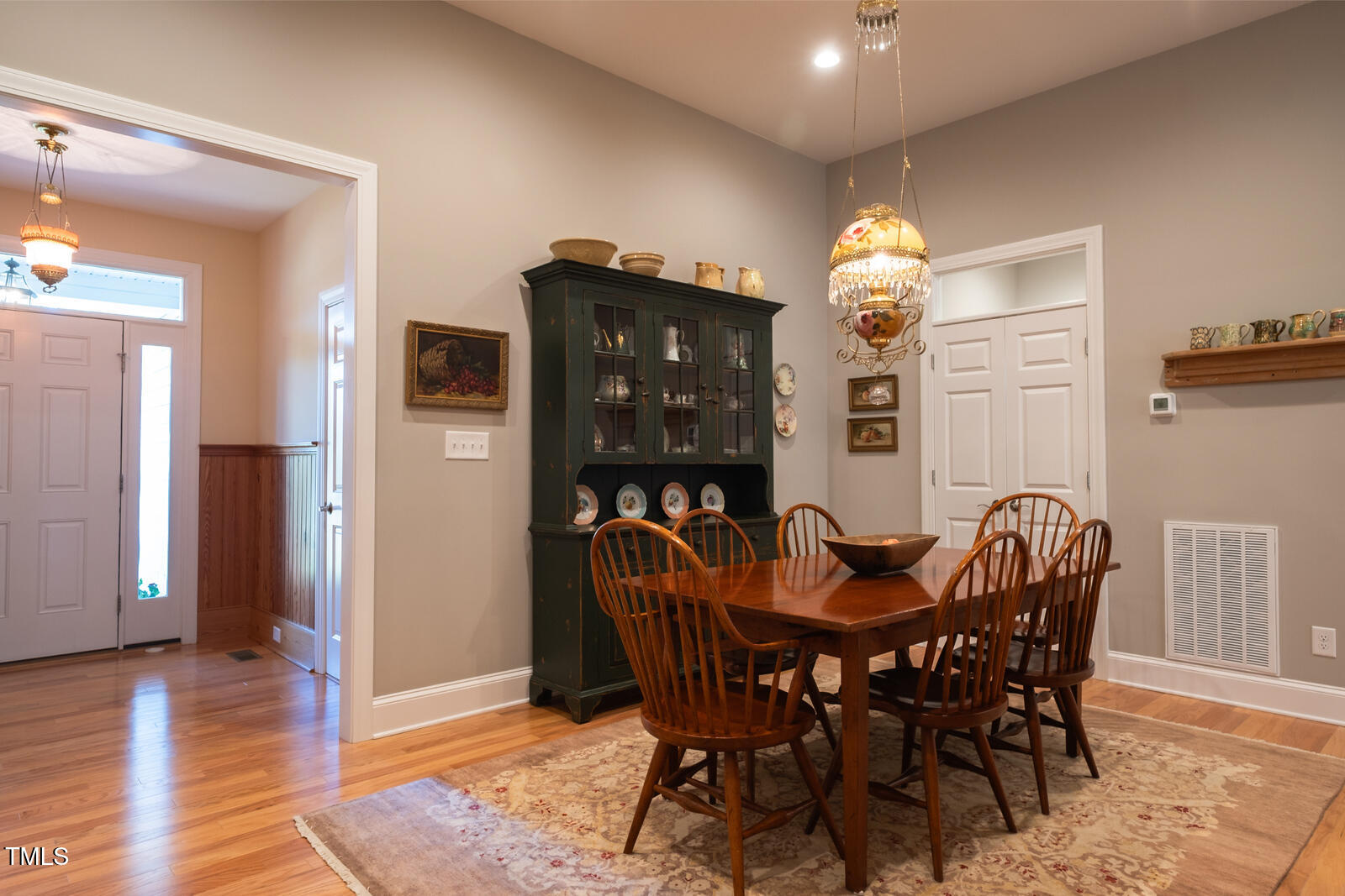 4331 Millcreek Circle Pittsboro, NC 27312 - Photo 37 of 56 a view of a dining room with furniture and chandelier