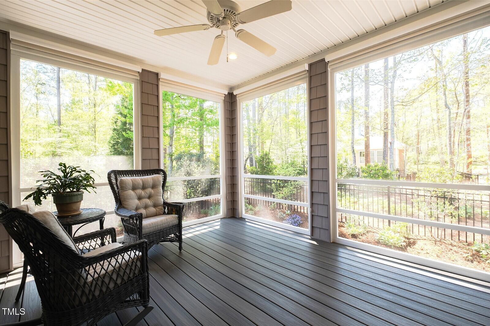 4331 Millcreek Circle Pittsboro, NC 27312 - Photo 44 of 56 a living room with furniture and a floor to ceiling window