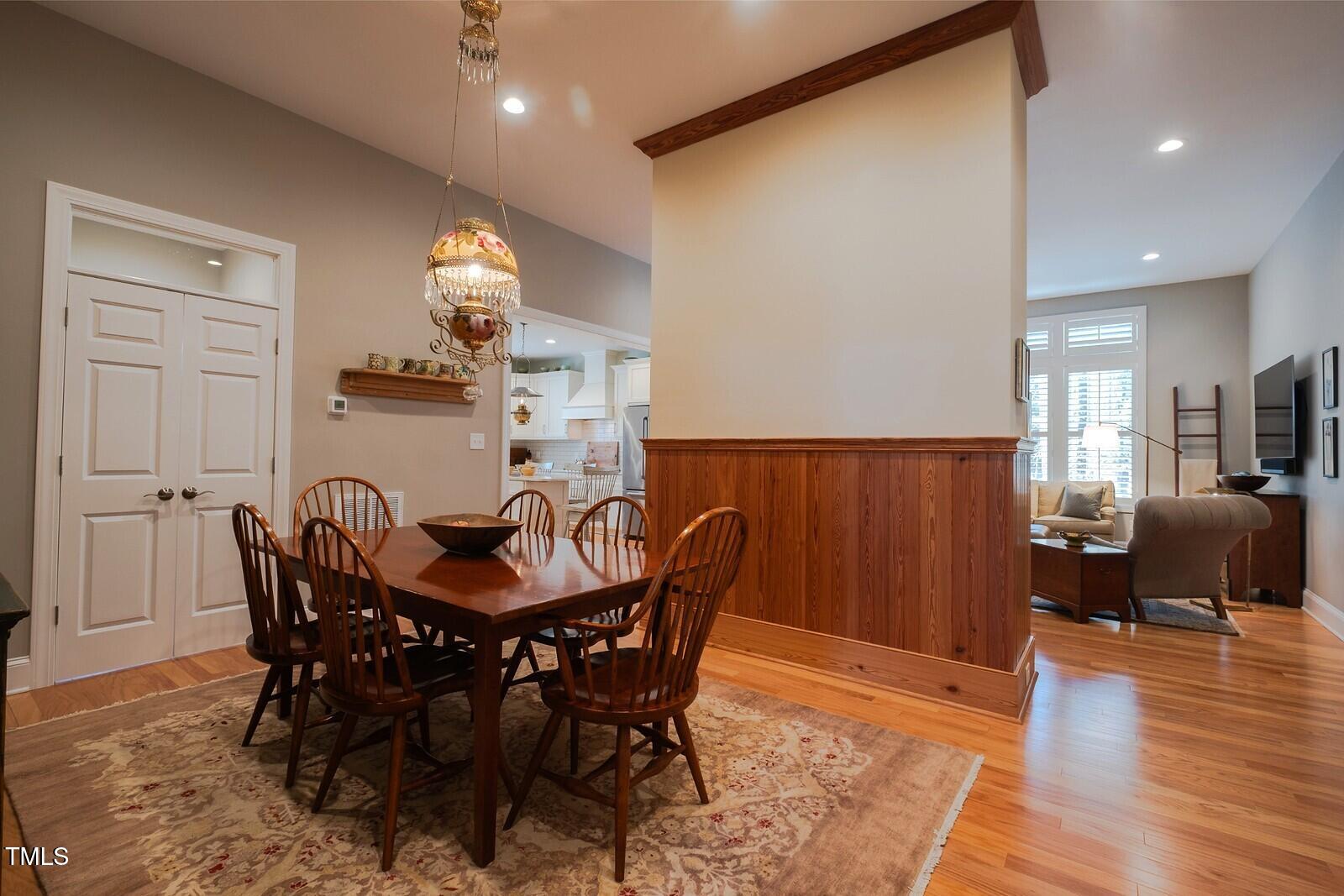 4331 Millcreek Circle Pittsboro, NC 27312 - Photo 5 of 56 a view of a dining room with furniture and wooden floor