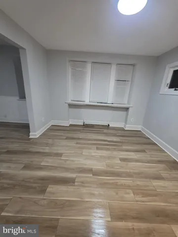 a room with a bed and a window