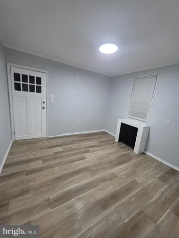 a big room with wooden floor