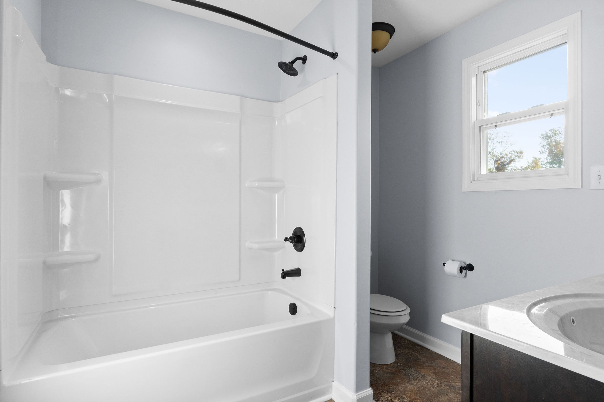 3815 Harvest Ridge Clarksville, TN 37040 - Photo 14 of 24 a bathroom with a bathtub and a toilet