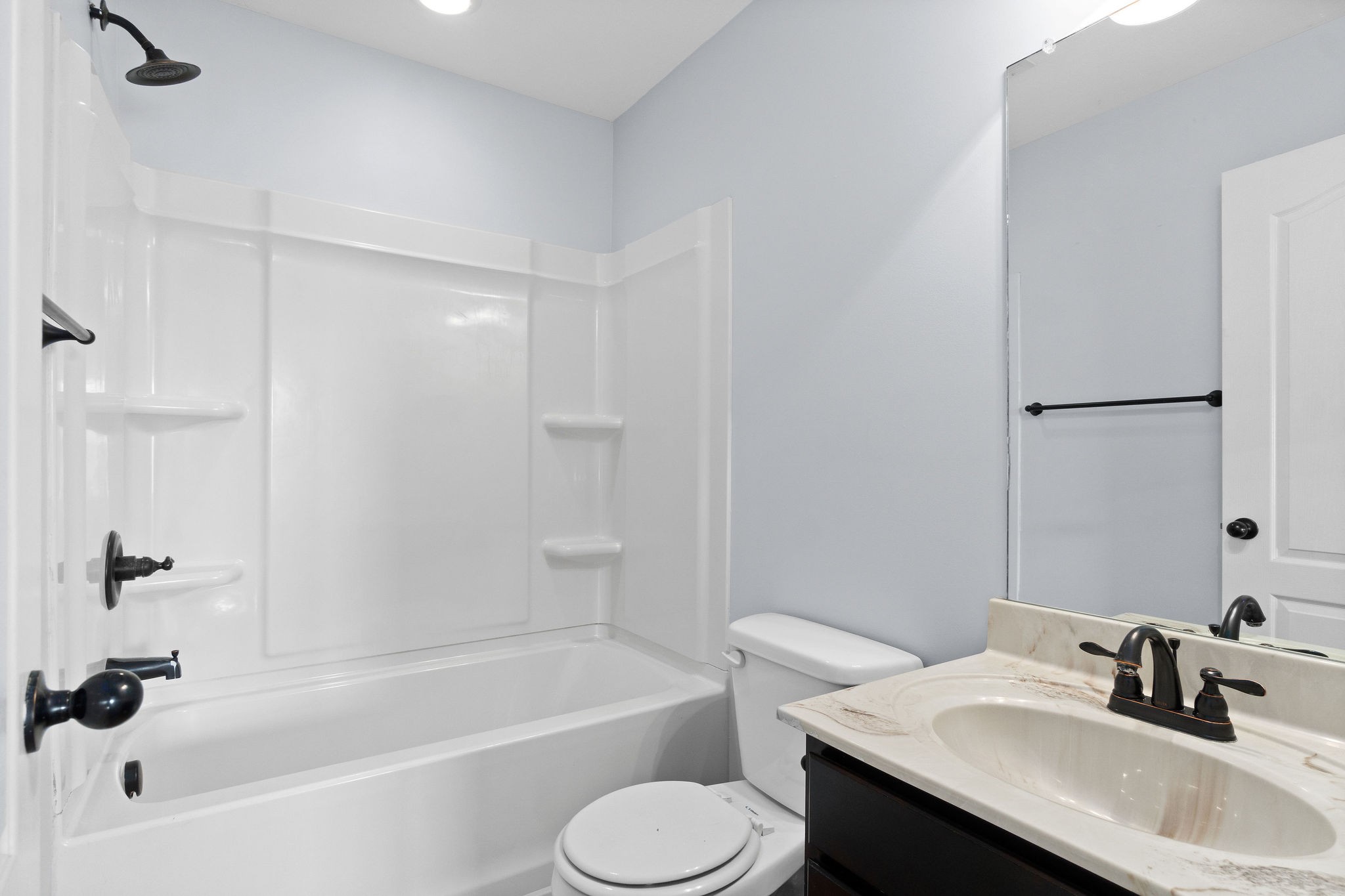3815 Harvest Ridge Clarksville, TN 37040 - Photo 19 of 24 a bathroom with a sink toilet and bathtub